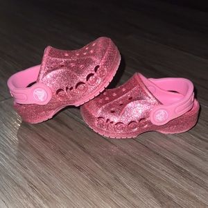 Pink sparkly crocs